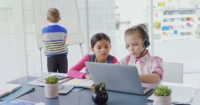 Children Collaborating in Modern Classroom Setting with Laptops and Learning Tools - Download Free Stock Images Pikwizard.com