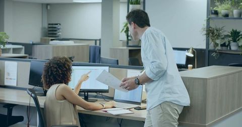 Team Collaboration at Modern Open Plan Office with Technology