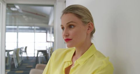Thoughtful Businesswoman Taking Break in Modern Office