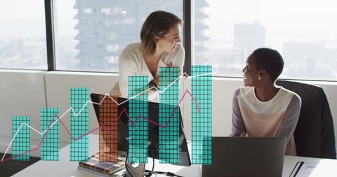 Diverse Business Team Analyzing Financial Data Graphics