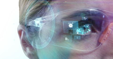 Woman wearing virtual reality glasses exploring a futuristic digital interface with various media icons projected over her eye, representing cutting-edge technology applications in digital communication, augmented reality experiences, and user interaction. Ideal for use in articles or presentations about the future of technology, innovation in digital interfaces, or the impact of augmented reality in society.