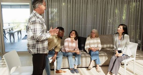 Diverse Group Therapy Session Promoting Mental Health Awareness