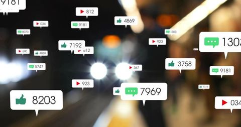 Floating social media engagement bubbles overlaying urban transit platform at night with headlights