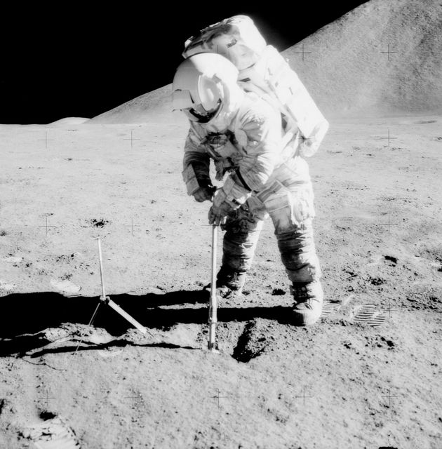 Astronaut Collecting Soil Samples During Apollo 15 Mission on the Moon - Download Free Stock Photos Pikwizard.com
