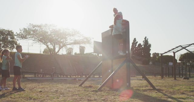 Kids Enjoying Outdoor Playground during Sunset - Download Free Stock Images Pikwizard.com