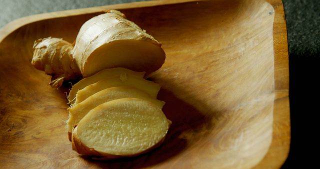 Fresh Ginger Root Slices in Wooden Dish - Download Free Stock Images Pikwizard.com