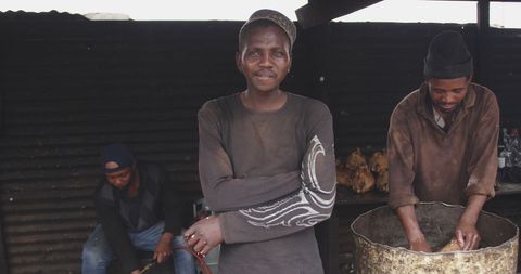 African american butchers working in traditional shop setting