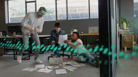 Team Collaborating on Business Strategies with Digital Data Visuals