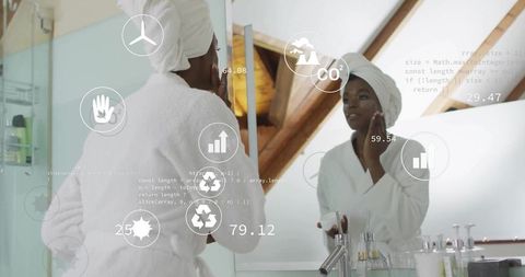 Woman in bathrobe applying skincare cream with ar technology icons