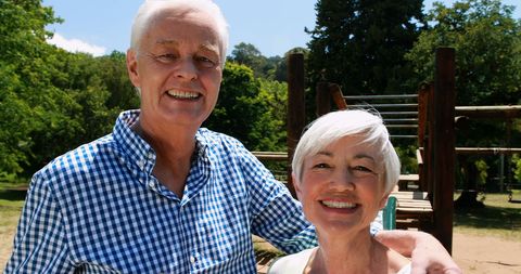 Smiling Senior Couple Enjoying Outdoor Park Visit