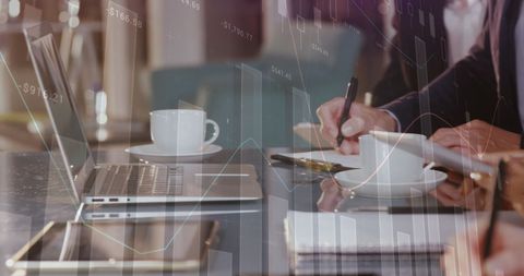 Business Meeting Collaboration with Laptops and Coffee