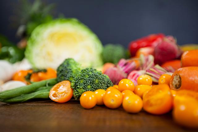 Close-Up of Fresh Vegetables on Wooden Table - Download Free Stock Photos Pikwizard.com