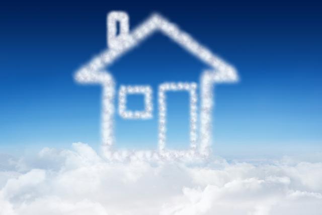 Picture displays a house shape formed by clouds against a clear blue sky. Suitable for real estate advertisements, dream home concepts, and inspirational or imaginative themes in marketing materials.