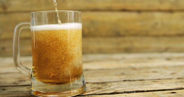 Beer Pouring into Mug on Rustic Wooden Table - Download Free Stock Images Pikwizard.com