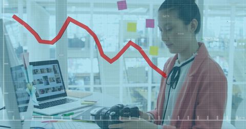 Businesswoman analyzing financial decline in modern office