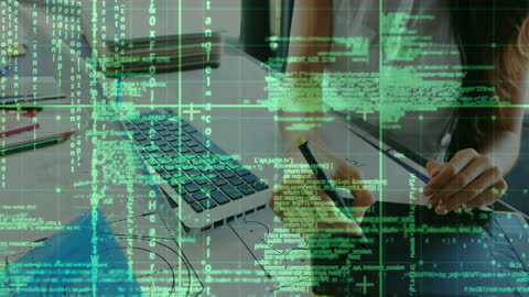 Executive Working on Graphic Tablet and Laptop with Digital Overlay