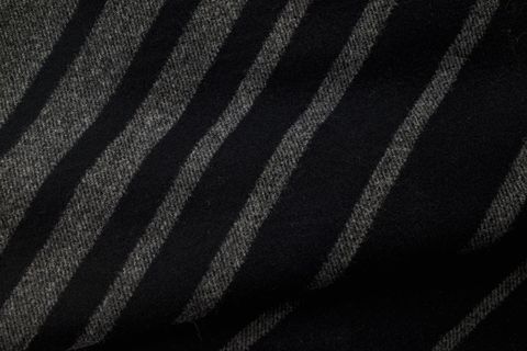 Dark Diagonal Wool Fabric Texture with Soft Black and Gray Stripes for Stylish Backgrounds