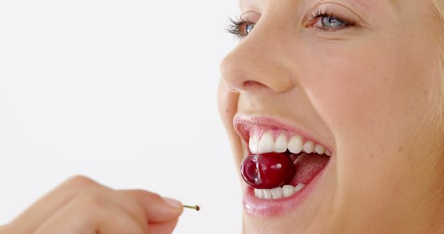 Woman Enjoying Fresh Ripe Cherry Close-Up - Download Free Stock Images Pikwizard.com