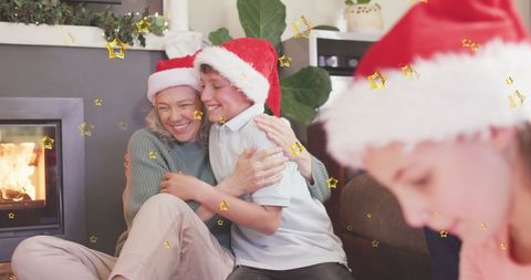 Happy Family Celebrating Christmas Together with Stars and Santa Hats