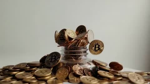 Falling Bitcoin Coins Filling Jar Overwhelming Symbolizing Volatile Investments