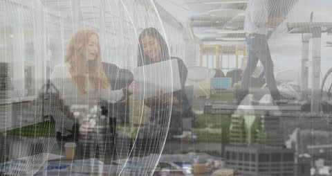 Diverse Team Collaborating in Modern Office with Virtual Overlay