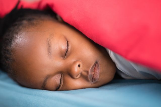 Close-Up of Young Girl Sleeping Peacefully in Bed - Download Free Stock Photos Pikwizard.com