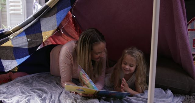 Mother and Daughter Reading in Cozy Blanket Fort - Download Free Stock Images Pikwizard.com