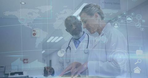 Doctors analyzing patient data with digital interface at hospital