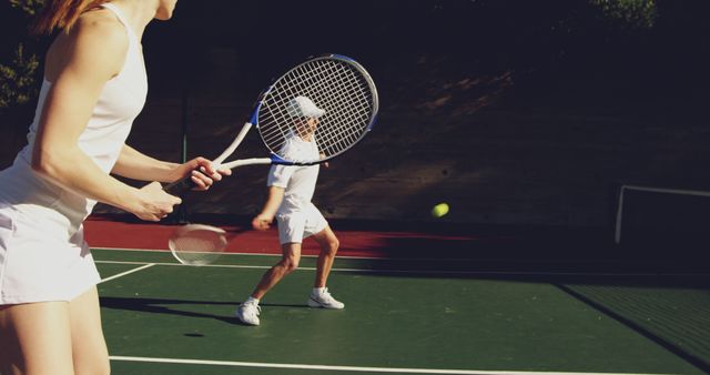 Tennis Players Deftly Engaging in Dynamic Sport - Download Free Stock Images Pikwizard.com