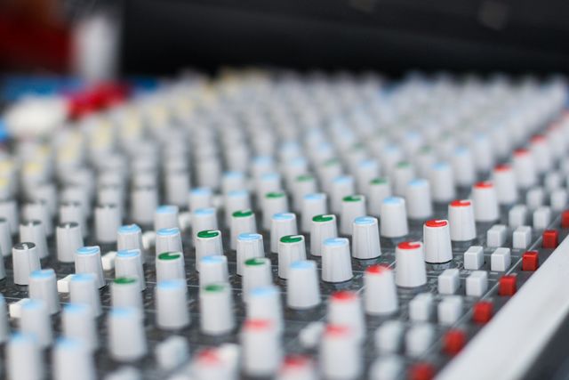 Perfect for illustrating recording studios, sound engineering, and music production setups. Ideal for articles about audio technology, tutorials on sound mixing, and promotional materials for music industry professionals and recording services.