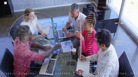 Diverse Business Team Meeting with Digital Financial Overlay