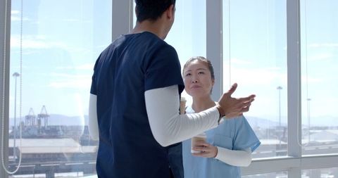 Healthcare Professionals Collaborating in Modern Hospital Space - Download Free Stock Images Pikwizard.com