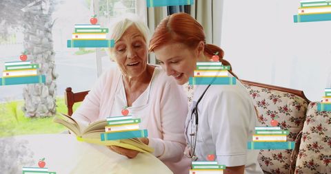 Senior woman reading book with compassionate nurse in cozy home environment