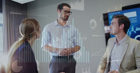 business team discussing growth with virtual analytics charts - Download Free Stock Images Pikwizard.com