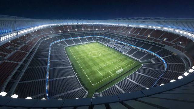 Aerial view of modern empty football stadium at night with led floodlights