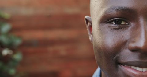 Happy Barista Smiling in Rustic Coffee Shop