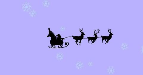 Santa's sleigh silhouette in festive purple sky