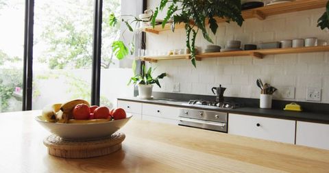 Spacious Modern Kitchen with Natural Light and Minimalist Decor