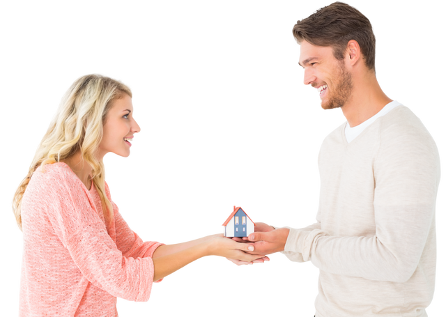 Attractive Young Couple Holding Transparent Miniature House Model - Download Free Stock Videos Pikwizard.com