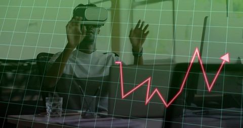 Man in vr headset manipulating virtual analytics interface
