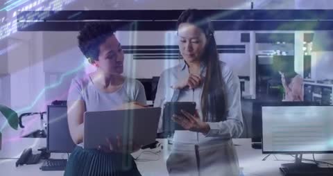 Software Engineers Collaborating with Digital Interface in Office