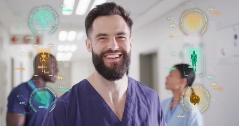 Smiling healthcare professionals with digital interface in hospital
