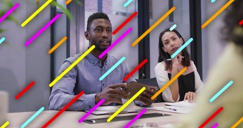 Diverse Team Meeting with Digital Devices for Collaborative Brainstorming