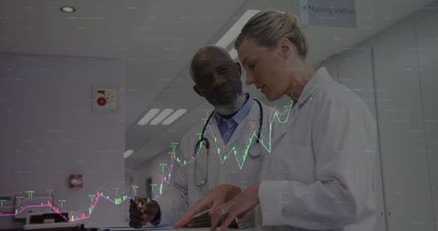 Doctors Collaborating with Financial Data Overlay in Healthcare Setting