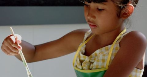 Child engaging in creative art at school