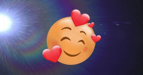 Vibrant smiling emoji with hearts and lens flare