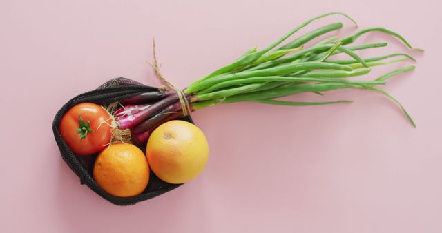 Fresh Organic Vegetables and Fruits in Mesh Bag on Pink Background - Download Free Stock Images Pikwizard.com