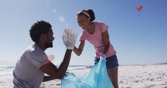 Happy Young Couple Volunteering Beach Cleanup on Sunny Day - Download Free Stock Images Pikwizard.com