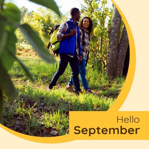 Couple enjoying stroll in nature with hello september message