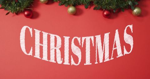 Festive Christmas Design with Evergreen Garland and Ornaments